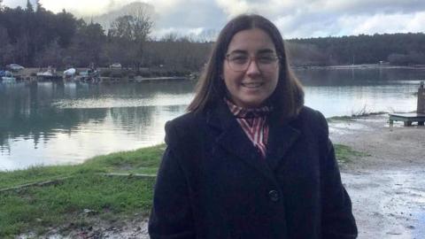 Tampere Talent Ambassador Zeynep Kaynar on a lake shore