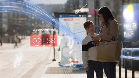 A boy and a woman holding a mobile phone in the street. Embedded in the image are various graphic elements related to digital development.