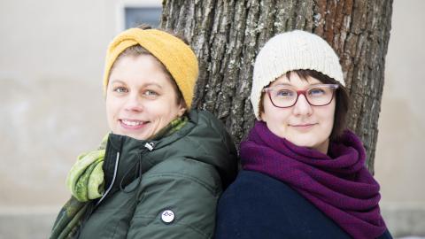 Emmi Nieminen and Elina Seppänen look smiling at the camera.