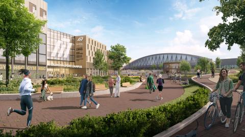 Hakametsä Sport Campus -alueen tulevaisuuden havainnekuva. Sisältää ihmisiä, rakennuksia ja puistoaluetta.