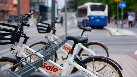 Two city bikes at the city bike station in Hervanta.