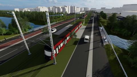 Kuvassa silta, ratikka, vihreää ja taloja taustalla.