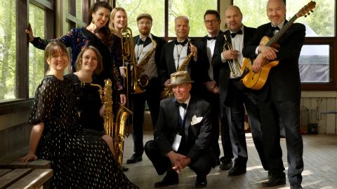 The Swing Doctors pose with their instruments.