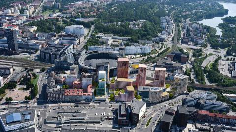 Kuvassa uusia rakennuksia havainnekuvina ilmakuvassa.