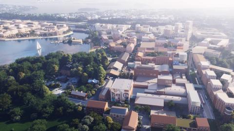 Havainnekuvassa näkyy etualalla Hiedanrannan tehdas sekä suunniteltuja rakennuksia sen ympärillä kauniina kesäpäivänä.