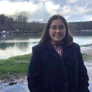 Tampere Talent Ambassador Zeynep Kaynar on a lake shore