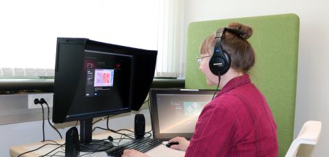 Customer using hobby space Vision's computer.