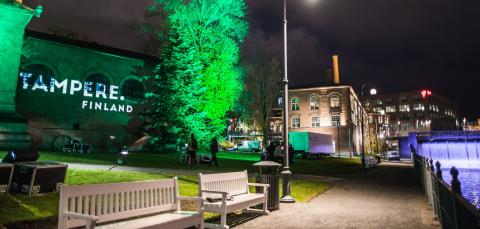 Tampere.Finland logo projected in a wall of the building near Tammerkoski