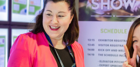 An older person presenting tasks to a cheerful young person.