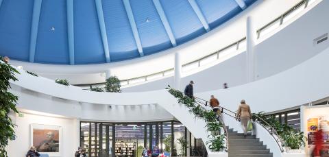 The main library lobby and the stairs leading to the mezzanine floor.