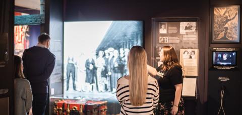 People follow a guided tour of Nootti Museum.