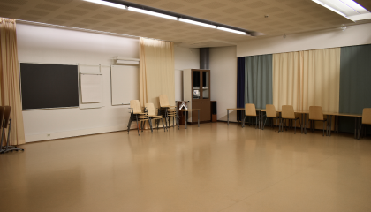 The Severi Hall in Sampola, featuring mirrors that can be covered with curtains, boards, and chairs.