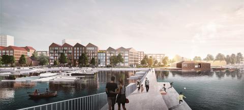 Kävelijöitä uudella sillalla Ratinan alueelta Viinikanlahteen, vastarannalla Viinikanlahden uusia asuntoja