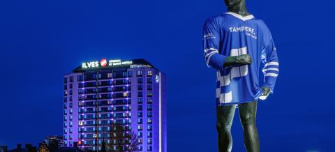 Statue of Hämeensilta bridge dressed in a Hockey jersey. 