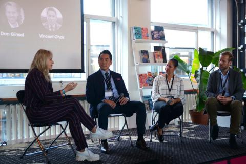 Margarita Khartanovich in a panel discussion with three other people