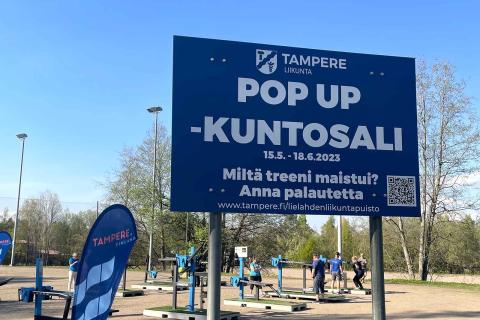 A sign in the Pop up gym at Lielahti Sports Park, asking how you liked your workout and asking for feedback.