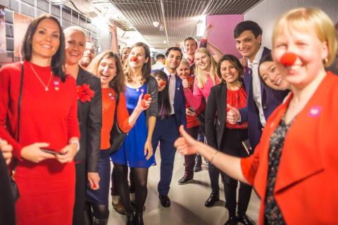 Group of Tampere Ambassadors standing in the Red nose day event.