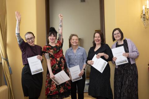 Janina Ahlfors, Liisa Aholainen, Merja Kostamovaara, Niina Niiniluoto and Mia Saharla pose for the camera at the Town Hall.