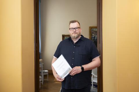 Teemu Haapakoski poses for the camera at the Town Hall.
