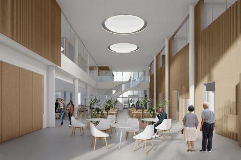 Havainnekuva aulasta, jossa on pöytiä ja puunväriset seinät sekä suuret pyöreät kattovalaisimet.