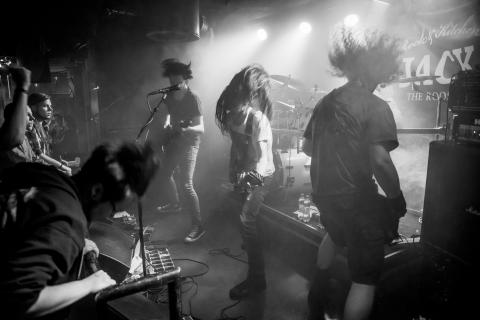 Rockband is playing on the stage.